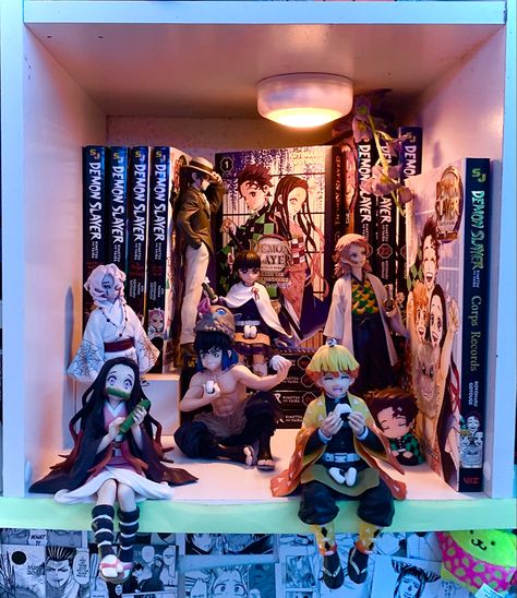 volumes 1-4, 21-23, 1 manga extra (stories of water and flame), 2 fan books, and 3 light novels and figures Manga Collection Display, Demon Slayer Collection, Demon Slayer Manga Collection, Anime Collection Room, Anime Figure Shelf, Anime Room Design, Anime Figures Collection Display, Shelving Manga, Anime Shelves