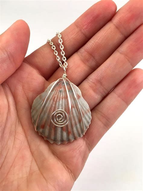 0413 Sunrise Shell Triple Wire Wrapped Pendant w/ Chain | Wire wrapped ... Seashell Wire Wrap, Seashell Jewelry Ideas, Diy Seashell Jewelry, Shell Necklace Diy, Mens Jewelry Diy, Seashell Jewelry Diy, Homemade Jewellery, Acorn Jewelry, Sunrise Shell