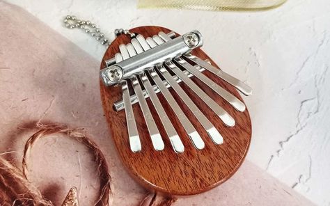 Mini Kalimba 8 Keys Thumb Piano Mini Kalimba, Thumb Piano, Magic Eraser, Solar Powered Lights, Shoe Covers, Incense Holder, Sell Out, Cool Gadgets, Brush Set