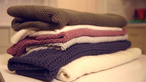 How to fold chunky sweaters so they stay perfectly stacked - TODAY.com Fold Sweaters, How To Fold Sweaters, How To Fold Pants, Organize Your Closet, Chunky Sweaters, Clothes Closet Organization, Shirt Folding, Cleaning Out Closet, Clothes Organization Diy