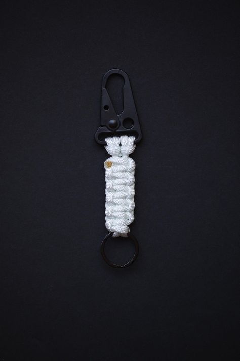 Paracord Keychain for Men - Carabiner Keychain 💎 #EDCKnifeBeads #KnifeAccessories #EverydayCarry #EDC #GearCustomization #TacticalBeads #ParacordBeads #HandcraftedBeads #ArtisanBeads #KnifeCollecting #KnifeEnthusiast #GearUpgrade #UniqueBeads #FunctionalArt Paracord Accessories, Cobra Weave, Carabiner Keychain, Paracord Beads, Paracord Keychain, Keychain For Men, Touch Of Gray, Lanyard Keychain, Army Fashion