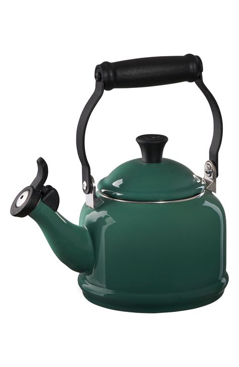 Durable carbon-steel composition with a glossy enameled finish ensures this classic tea kettle will stand the test of time. The flip lid features a single-tone whistle to let you know when water has reached a rolling boil, while a heat-resistant, ergonomic handle ensures safe and easy pouring. Compatible with gas, electric, ceramic, halogen and induction heat sources, this kettle is designed with a generous base to ensure maximum contact and a quick boil. 9 1/2" x 6 3/4" x 10" 2.4 lb. Holds 1.25 Le Creuset Kettle, Coffee Oatmeal, Stovetop Kettles, Stovetop Kettle, Gooseneck Kettle, Enameled Cast Iron Cookware, French Press Coffee, Tea Makers, Fine Craft