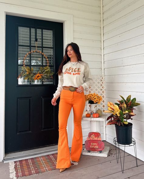 If coffees are allowed to be fall themed, then so are we!😍🍁 Styled by: @lorilynngranger0 #fall #outfitinspo #spookyseason #plussizefashion #comfortable #womensfashion #backtoschool #falloutfits #demure Colorful Flare Pants Outfit, Colored Flare Jeans, Bell Bottom Leggings Outfits, Western Fall Outfits, Bell Bottom Leggings, Flare Jeans Outfit, Orange Jeans, Country Concert Outfit, Holiday Wear