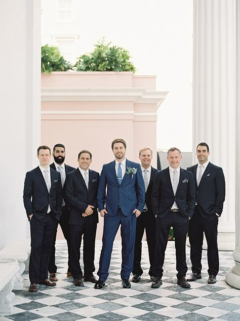 Groom In Blue Groomsmen In Black, Blue Groom Suit Black Groomsmen, Bestman Suit Groomsmen, Navy Blue Suit Groom, Navy Groomsmen Suits, Male Bridesmaid, Black Groomsmen Suits, Navy Blue Groomsmen, Blue Groom Suit