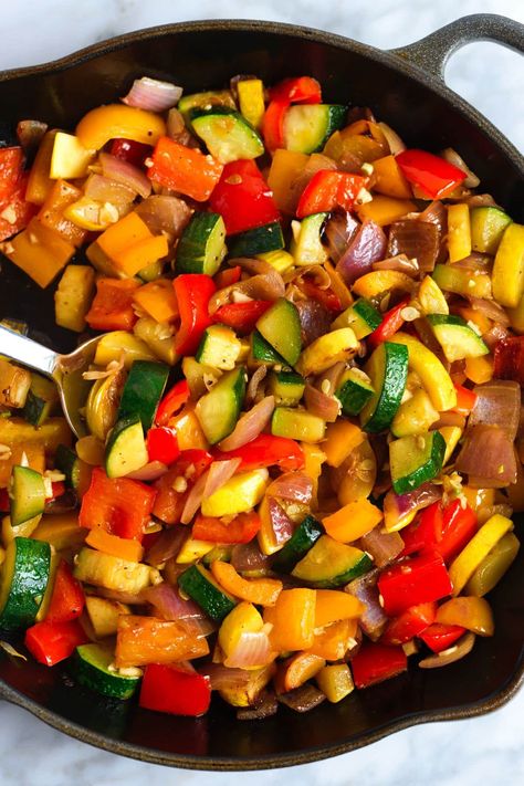 Easy sautéed vegetables recipe! We love this dish with onion, zucchini, bell pepper, and garlic, but you can substitute or add your favorite vegetables. These sautéed veggies are […] Zucchini Mixed Vegetables, Cast Iron Skillet Vegetables, Balsamic Veggies Sauteed, Cooking Fresh Vegetables, Assorted Vegetable Recipes, Sauteed Zucchini And Peppers, Bell Pepper Zucchini Onion, Veggie Melody Recipe, Healthy Sauteed Vegetables