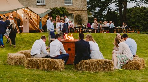 Backyard Wedding Fire Pit, Hay Bale Wedding Decorations, Wedding Fire Pit, Tipi Decor, Hay Bale Wedding, Hay Bale Seating, Mums Wedding, Under Canvas, Rural Wedding