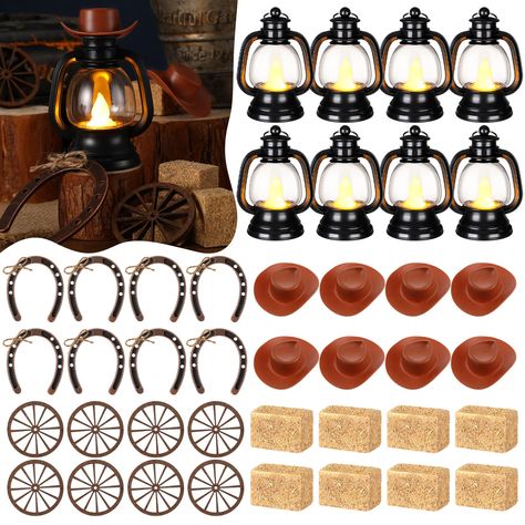 PRICES MAY VARY. Complete Western Themed Party Decorations Set: this collection consists of 60 combined sets of western cowboy theme party decorations; The package offers 12 mini lanterns, 12 mini cowboy hats, 12 mini horseshoes, 12 wagon wheels and 12 hay bales; This inclusive package will meet all your decorative needs, allowing for extra items to be stored for future use Delicate Western Cowboy Theme: our western theme centerpieces are suitable for those with a love for the west and cowboy cu Western Mason Jar Centerpieces, Simple Western Centerpiece Ideas, Cowboy Theme Party Centerpieces, Western Lantern Centerpieces, Dollar Tree Cowboy Party, Simple Birthday Decorations At Home Men, Montana Themed Party, A Little Cowboy Is On His Way Decor, Cowboy Party Table Decor