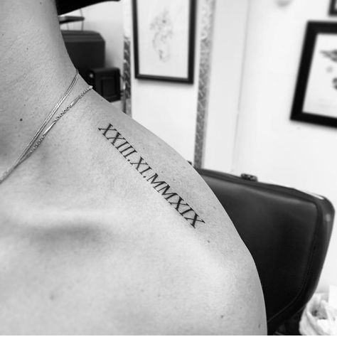 Bondi Ink Tattoo on Instagram: “Classic Roman numerals on trap by @blackinktattoos_” Shoulder Writing Tattoo Men, Roman Numeral Trap Tattoo, Shoulder Tattoo Roman Numerals, Shoulder Roman Numeral Tattoo, Mens Initial Tattoo, Traps Tattoo Men, Tattoo Shoulder Mens, Date Tattoo Ideas For Men, Tattoo Ideas Boys