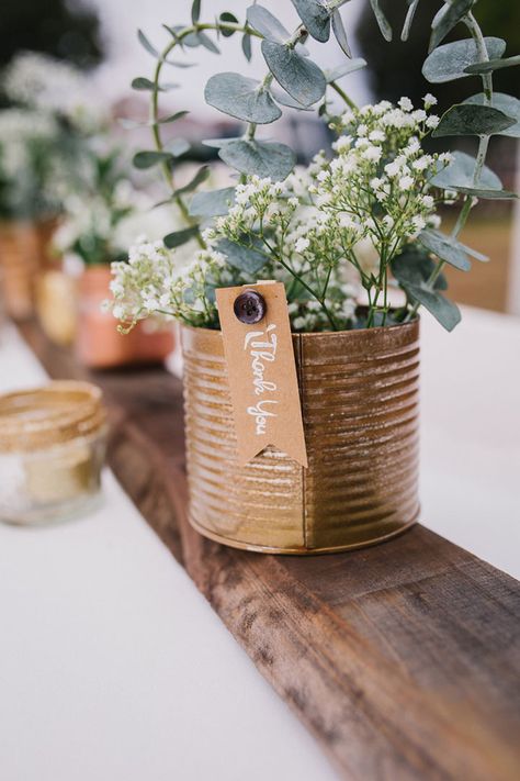 Rustic copper painted tin can vase as wedding favor Tin Can Flower Arrangements, Tin Can Wedding Ideas, Luncheon Centerpieces, Tin Can Centerpieces, Diy Wedding Flower Centerpieces, Wedding Centerpieces Diy Rustic, Upcycled Wedding, Painted Tin Cans, Beautiful Wedding Centerpiece