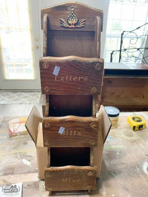 One of my favorite ways to save money is repurposing thrift store items to use as part of my home décor. Old wood mail sorters are an easy DIY project and can be found for cheap! Like this one, I repurposed a few months back. You can see it HERE.I found this one for $1.50. It was marked at $2.99 but it was the color of the day, so I scored it for 50% off. Even though it was outdated and had a few dings, it could still be saved! And what’s going on with those gold accents? Eeekk! For… Wood Basket Decor Ideas, Thrift Repurpose, Vintage Repurposed Items, Chalkboard Serving Trays, Mail Sorters, Thrift Store Diy Projects, Mail Sorter, Thrift Store Diy, Wood Items