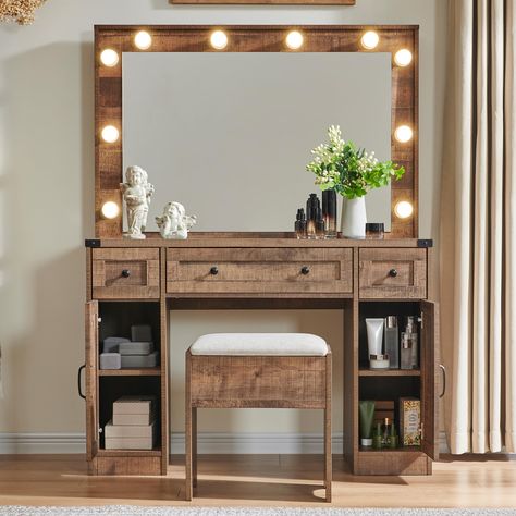 PRICES MAY VARY. Farmhouse-Style Vanity Desk ： Made from high-quality engineered wood with a charming farmhouse design, this vanity adds elegance to your room while ensuring long-term durability and stability. Clear Reflection Glass Mirror ： Provides a sharp, clear reflection for precise makeup application, enhancing your beauty routine. Hollywood Makeup Mirror ： Features three lighting modes (warm white, cool white, and warm yellow) to ensure flawless makeup application every time. Generous Sto Hair Vanity Station, Antique Makeup Table, Things To Build For Your Room, Make Up Stations In Bedroom, Makeup Vanity Lighting Ideas, Diy Vanity Table How To Build, Brown Vanity Bedroom, Western Makeup Vanity, Wooden Vanity Bedroom