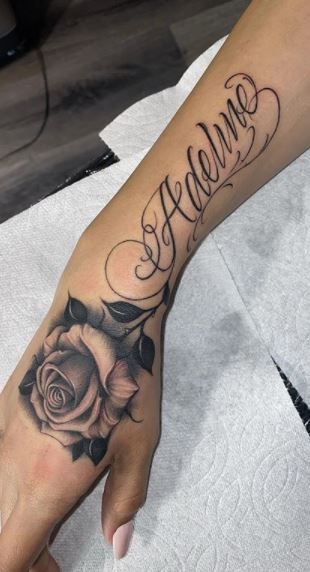 Best Forearm Tattoos Women, Tats On Forearm, Zen Tattoos For Women, Lightly Shaded Rose Tattoo, Ray Name Tattoo, Forearm Tattoo Women Names, Forearm Name Tattoo Women, Rose Tattoo With Name Forearm, Last Name Forearm Tattoo