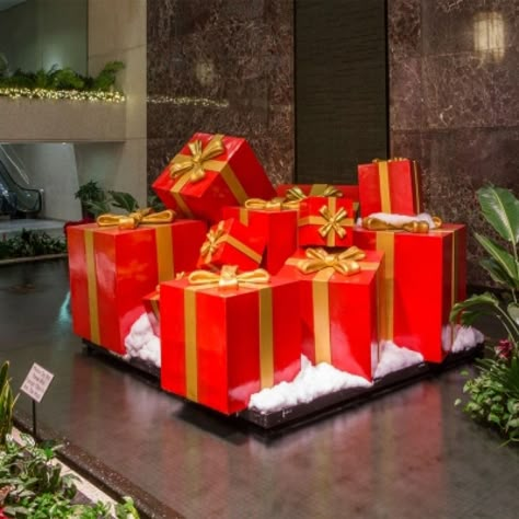 Giant Gift Boxes | Barrango, Inc. Christmas Stage Design, Big Christmas Gifts, Mall Christmas, Diy Christmas Door Decorations, Commercial Christmas Decorations, Big Gift Boxes, Giant Christmas Ornaments, Corporate Christmas Parties, Disney Christmas Decorations