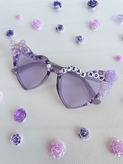 "Step into the fairy-tale world of the Speak Now era with these magical sunglasses. Channel your inner Swiftie and celebrate Taylor's lyrical storytelling. 💜🌌 #SpeakNowSunnies #SwiftieMagic #TaylorInspired" Taylor Swift Speak Now Era, Revenge Fashion, Speak Now Taylor Swift, Speak Now Era, Eras Concert, Number Beads, Eras Tour Outfit, Taylor Swift Party, Taylor Swift Tour Outfits