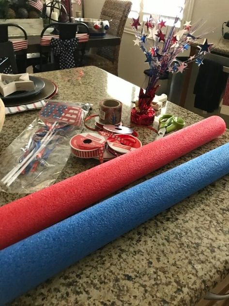 Last year I made some wooden firecrackers for July 4th, and this year I wanted to make something a bit different. I was at the Dollar Store and saw some pool noodles and came up with this idea. #diy #fourth of july #july #america #patriotic #diy decor Diy Dishwasher Tablets, Wooden Firecrackers, Golf Cart Decorations, Farmhouse Style Wreath, Crafty Decor, 4th Of July Parade, 4th July Crafts, Fourth Of July Decor, Parade Float