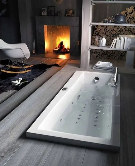 a sunken bathtub with a deck right in the bedroom with a fireplace, looks very natural and very relaxing and enjoyable Sunken Bathtub, Rustic Chalet, Chalet Interior Design, Chalet Interior, Tile Layout, Bathtub Remodel, Inspiration Bathroom, Scandinavian Bathroom, Bathtub Design