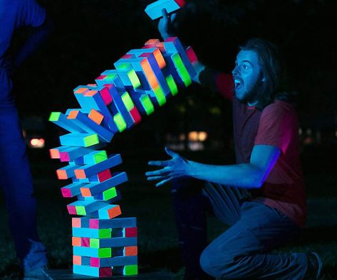 Glow Party Games, Glow In Dark Party, Glow In The Dark Party, Container Water Gardens, Giant Jenga, Blacklight Party, Dark Party, Stacking Blocks, Water Gardens