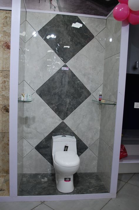 Washroom Design Tails, Tails Showroom Design, Varmora Bathroom Tiles, Bathroom Tails Wall Design, Tails Flooring Design Bathroom, Toilet Wall Tiles Pattern, Tile Showroom Interior Design Ideas, Tails Flooring Design, Washroom Wall Tiles