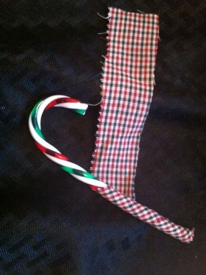 fabric covered candy canes, crafts, seasonal holiday decor, Hot glue one end then wrap the fabric around the candy cane Outdoor Christmas Decorations Lights, Candy Cane Ornaments, Homemade Fabric Softener, Primitive Country Christmas, Candy Cane Crafts, Mercury Glass Christmas Ornaments, Candy Cane Ornament, Candy Cane Wreath, Prim Christmas