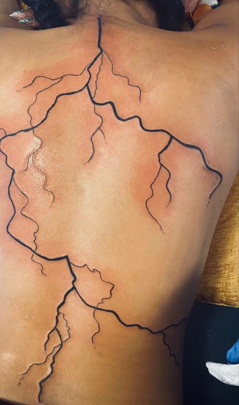 Lightening Back Tattoos, Spine Scar Cover Up Tattoos For Women, Universe Tatoos Ideas, Lightning Tattoo Spine, Lightening Tattoo Back, Zipper Spine Tattoo, Lightening Spine Tattoo, Back Tattoos Lightning, Lighting Spine Tattoo