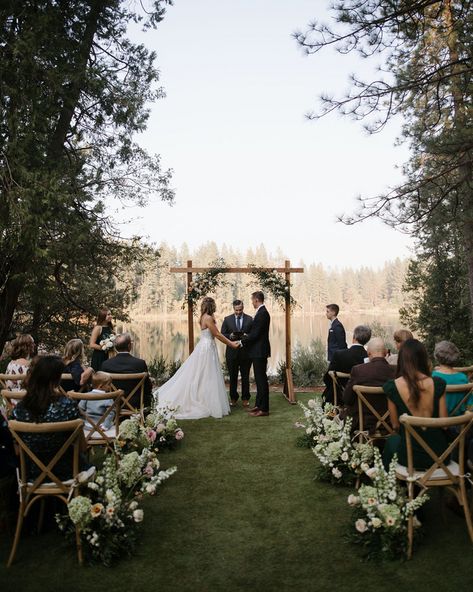 The team at @Fignvine killed it with this dreamy ceremony decor - peep those aisle arrangements! 🌿​​​​​​​​ Photo: @reveriefilms.co​​​​​​​​​​​​​​​​ Rentals: @memorableeventsrentals​​​​​​​​​​​​​​​​ Florals: @fignvine​​​​​​​​​​​​​​​​ Planning: @courtneylawhonevents Small Outdoor Ceremony Set Up, Walkway To Wedding Ceremony, Alters Wedding Outdoor, Wedding Ceremony In Nature, Outdoor Covered Wedding Ceremony, Outdoor Elopement Ceremony Decor, Ceremony Outdoor Decor, Spring Outdoor Wedding Ceremony, Lake View Wedding Ceremony