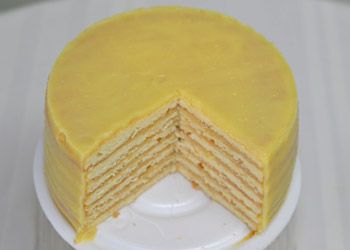 This recipe for lemon cheesecake by the Southern chef Edna Lewis was featured in a Times article about Southern cakes It is a lovely layer cake that makes economical use of yolks and whites, and it’s nothing like what a New Yorker thinks of as cheesecake The “cheese” is really an eggy lemon curd piled between layers of cake made sturdy by egg whites.  Picture is of one of Dean's since  NYTimes didn't have a picture. Southern Lemon Cheese Layer Cake, Lemon Doberge Cake Recipe, Lemon Cheese Layer Cake, Doberge Cake Recipe, Seven Layer Cake, Edna Lewis Recipes, Doberge Cake, Southern Brunch, Southern Cakes