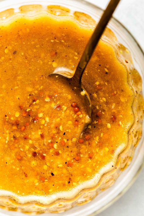 This 5-Minute Whole Grain Mustard Vinaigrette is a fast & flavor-packed salad dressing made with whole-grain mustard for an extra pop of tangy texture. Whisk the mustard with a few other pantry staple ingredients like olive oil & pure maple syrup for a light & punchy homemade vinaigrette. Perfect for dressing hearty fall-winter salads! #wholegrainmustardvinaigrette #wholegrainmustarddressing #wholegrainmustardsauce #saladdressing #dressingrecipes #vinaigretterecipes #vinaigrettedressing Mustard Salad Dressing, Packed Salad, Winter Salads, Whole Grain Mustard, Homemade Vinaigrette, Seed Salad, Mustard Vinaigrette, Maple Mustard, Red Wine Vinaigrette