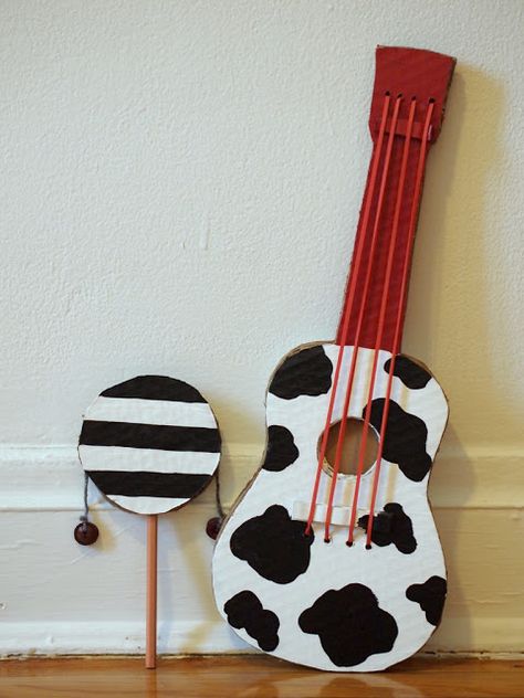 Pink Stripey Socks: Make a cardboard guitar Cardboard Guitar, Instrument Craft, Homemade Instruments, Diy Instruments, Handmade Charlotte, Super Party, Diy Musical Instruments, Diy Cardboard, Arts And Crafts For Kids