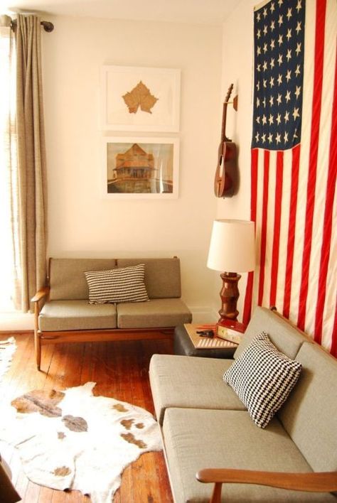 A vintage flag, alongside a guitar and a framed farmhouse print, brings some Americana charm to the bedroom's sitting area in this Nashville home. Country Kitchen Flooring, Country Style Dining Room, Americana Home Decor, Modern Americana, Americana Home, Bedroom With Sitting Area, Country Dining Rooms, American Flags, Country Furniture