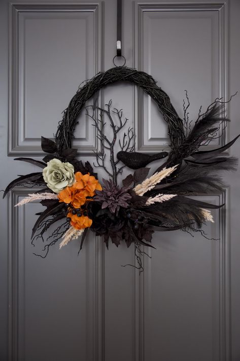 PRICES MAY VARY. Unique Design: This oval Halloween wreath is a standout decoration for your front door and porch, creating a perfect blend of elegance and spookiness for the Halloween Holiday Handcrafted with Care: Each wreath is meticulously handcrafted by experienced wreath makers, ensuring that every piece is unique and of the highest quality Natural Materials: The oval base is handwoven from natural grapevines, painted black and naturally air-dried to enhance the Halloween vibe Large Size: Halloween Front Door Wreath, Gothic Wreath Diy, Grapevine Halloween Wreath, Halloween Reefs Front Doors, Neutral Fall Wreath, Halloween Craft Decor, Halloween Wreaths For Front Door Diy, Modern Fall Wreaths For Front Door, Door Wreaths Halloween