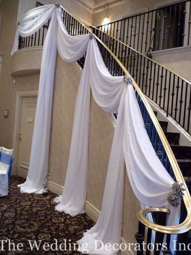 Something like this for the stairway, but with color! Drapery Wedding, Stairway Decor, Wedding Staircase, Reception Head Table, Banquet Decor, Stairway Decorating, Crystal Globe, Double Staircase, Decorating Wedding