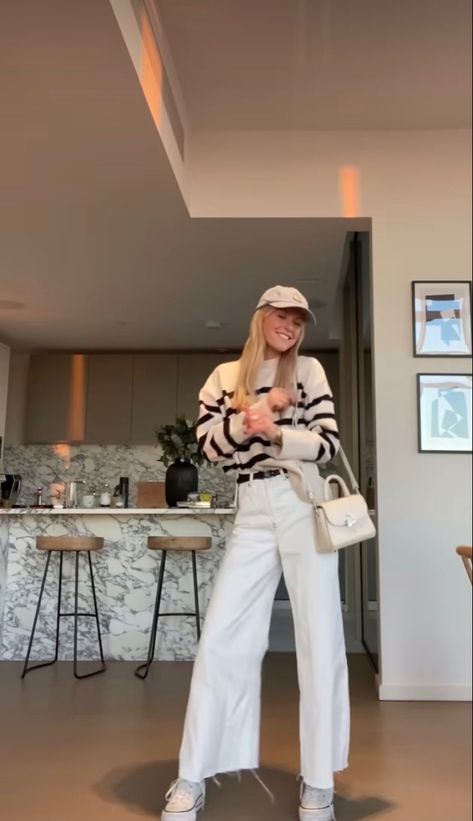 Striped White Sweater Outfit, White Pants With Sweater, White Cord Pants Outfit, White Pants And Sweater Outfit, White Flare Pants Outfit Casual, White Stripped Sweater Outfit, Cream Flares Outfit, Cream Baseball Cap Outfit, Cream Cap Outfit