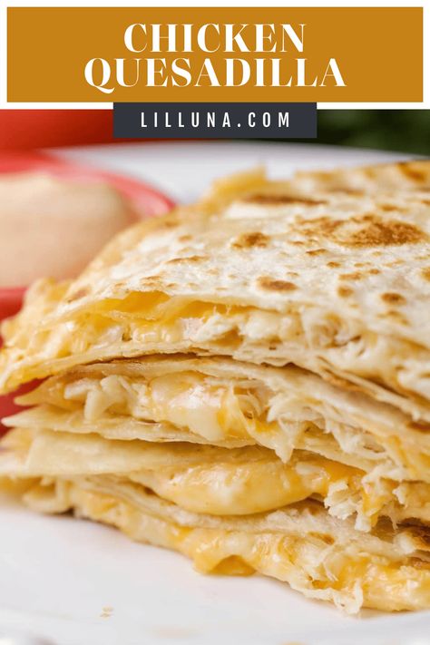 This easy, cheesy chicken quesadilla is a crowd favorite. Filled with a delicious homemade sauce, these hand-held bites are irresistible! #quesadillas #chickenquesadilla #mexicanrecipes #easydinners #dinnerideas Chicken Tender Quesadilla, Easy Chicken Quesadillas Simple, Easy Chicken Quesadillas Skillet, Chicken Quessidla Recipes, Blackstone Chicken Quesadillas, Quasidia Recipes, Chicken Quesadillas With Rotisserie, Chicken Casadias Quesadilla Recipes, Quesilladas Recipe