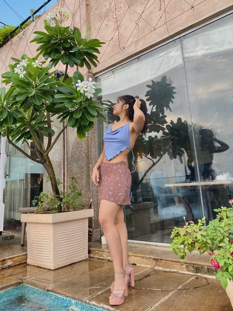 A mini Floral skirt in muted brown colour and a backless crop pastel blue top for a summer vibe Party Fits, Pool Party, Hot Summer, Summer Vibes, Pool, Outfit Inspo