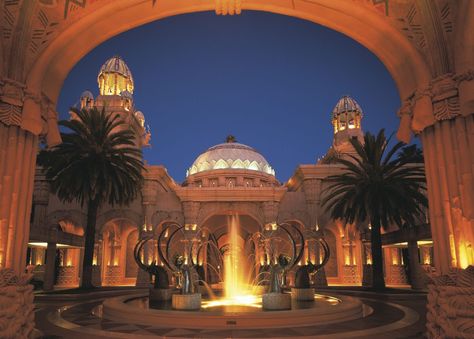 A six-story rotunda was conceived as the royal entrance chamber which overlooks a magnificent palatial lobby lounge. Sun City South Africa, Arabian Palace, Sun City Resort, The Lost City, Africa Do Sul, Exotic Places, Sun City, Hotel Reservations, City Hotel