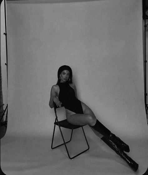 Black And White Chair Photoshoot, Posing With Chair Photo Shoot, Black And White Themed Photoshoot, Sitting Down Photography, White Boots Photoshoot, Studio Photoshoot Ideas Chair, Chair Fashion Photography, Sitting Model Poses Chair, How To Pose Sitting Down On A Chair