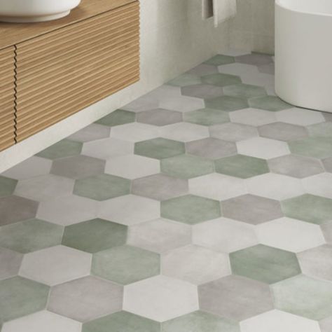 Introducing our new, plain matt hexagon, porcelain wall, and floor tiles. An ultra-modern hexagon shape with 4 contemporary colours to choose from. These tiles work perfectly in bathrooms, kitchens, hallways, and even patio areas. Mix these tiles with their patterned counterpart Capri Hexagon Tiles. Floor Tiles Bathroom Pattern, Colourful Tile Floor, Hexagon Floor Pattern, Bathrooms With Hexagon Tile, Pattern Tile Floor Bathroom, Small Kitchen Floor Tiles, Hexagon Kitchen Floor Tile, Bathroom Hexagon Tile Floor, Geometric Tiles Bathroom