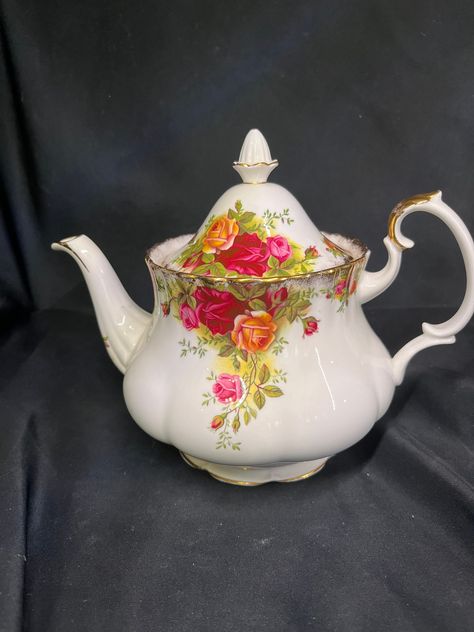 This exquisite teapot from Royal Albert's Old Country Roses collection is a true gem for any tea enthusiast. Made of high-quality bone china and crafted in England in 1962, it features a stunning multicolor design that will add a touch of elegance to any tea time. Its large size makes it perfect for serving multiple cups of tea, and its durability ensures that it will last for years to come. This teapot is a must-have for collectors and tea lovers alike, and its unique combination of style and functionality makes it a true treasure. *Signed on bottom by brand  FREE SHIPPING IN THE USA WILL CONSIDER OFFERS Tea Enthusiast, Royal Albert Old Country Roses, Teapots Unique, Old Country Roses, Birthday Inspo, Pretty China, Tea Party Garden, Aesthetic Coffee, Country Roses