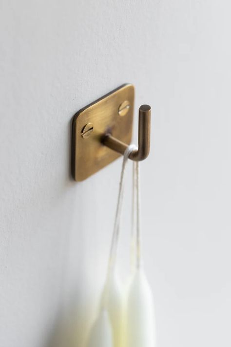 Simple, hand-made wall hook in warm, antiqued brass. Irregularities in finish will occur. Useful in the kitchen, bathroom, closets, and more. *Iron screws are not included. Made by Fog Linen Work Product Details:  1.25"x 1.25" projection 1" Wipe clean, polish if necessary Bathroom Closets, Brass Towel Hook, Hand Towel Hook, Antique Brass Bathroom, Brass Toilet Paper Holder, Brass Wall Hook, Fog Linen Work, Fog Linen, Brass Bathroom