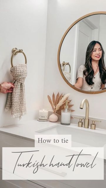 Risa Flynn | Content & UGC Creator on Instagram: "How to tie Turkish hand towel👏🏻 🫧 Are you the person who frustrated by seeing hand towel on the floor? Or fed up with fixing those every time you go to bathroom? 🙋🏻‍♀️ Try this hack to keep your towel tidy and clean🤍 . Turkish hand towel from @theloomia Use code : RISA FLYNN to save . . . . . #theloomia #apartmenttherapy #ihavethisthingwithtextiles #farmhousebathroom #cottagebathroom #handtowels #handtowel #howtotiehandtowel #homehacks #bat Bathroom Hand Towel Styling, Guest Bath Hand Towels, Bathroom Hanging Towel Ideas, Bathroom Hand Towel Holder Ideas Small Spaces, How To Fold A Hand Towel On A Ring, Styling Towels On Towel Bar, Hand Towel Bathroom Ideas, How To Tie A Hand Towel, Hand Towel Folding Ideas Bathroom