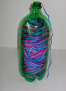 Luksi Creations: How to make a holder for your yarn out of a pop bottle Diy Yarn Holder, Crochet Yarn Holder, Crochet Organizer, Yarn Organization, Yarn Holder, Crochet Hack, Yarn Storage, Yarn Bowl, Yarn Diy