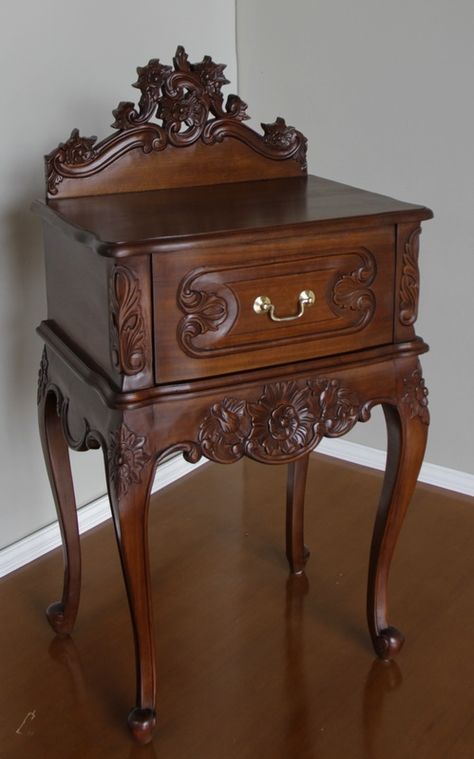 Intricately hand carved French Rococo Bedside with pediment. Hand crafted from solid mahogany and finished with a wax polish to  enhance the colour of the wood. Available from Lock Stock and Barrel Furniture. Hand Carved Wood Furniture, Rococo Bedside Table, Polish Furniture, Victorian Style Furniture, French Bedside Tables, Hand Carved Furniture, Rococo Furniture, Wood Carving Furniture, Vintage Bedside Table