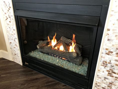 Gas fireplace rocks inside