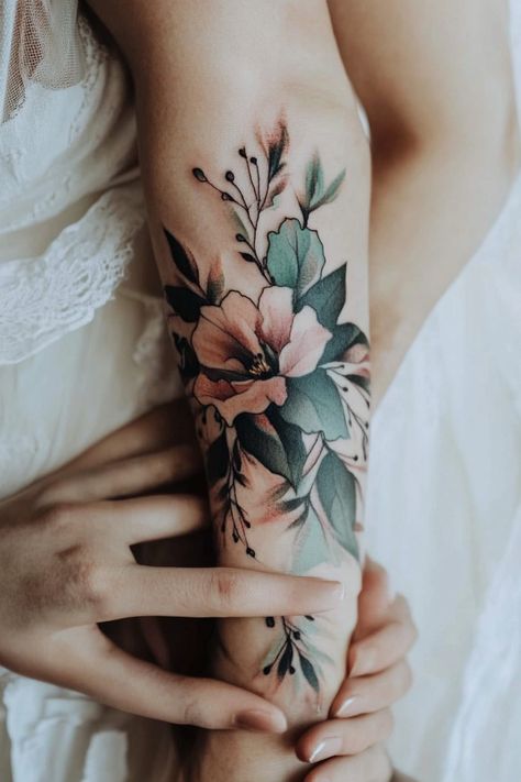 Floral tattoo on a person's forearm with hands gently touching it. Cover Up Flowers Tattoo, Flower Tattoo Cover Up, Beauty For Ashes Tattoo, Floral Tattoo Coverup, Mountain Tattoos For Women, Floral Cover Up Tattoo, Calla Lily Tattoo, Floral Tattoo Ideas, Vintage Floral Tattoos