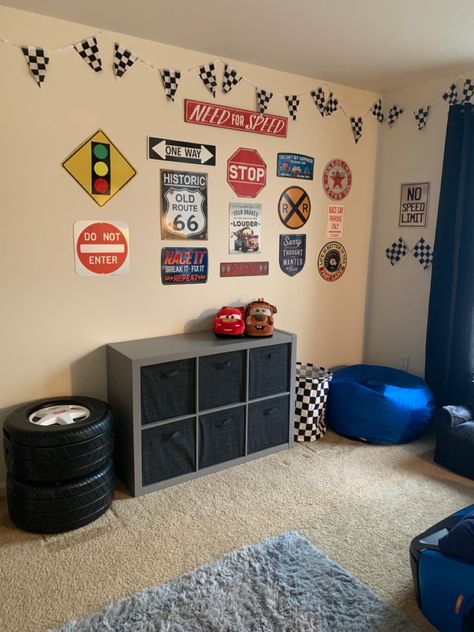 Hotwheel Room Ideas, Truck Bedroom For Toddler, Diy Car Themed Decor, Toddler Boy Truck Room, Hot Wheels Toddler Room, Hotwheels Storage Ideas, Disney Cars Room Decor, Boys Race Car Bedroom Ideas, Toddler Car Room Decor