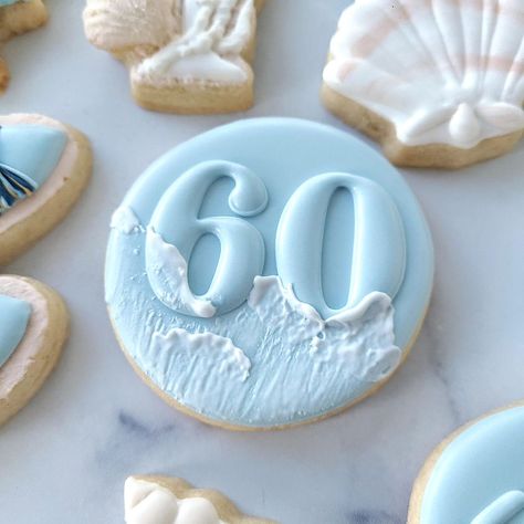 Celebrating Sixty by the Sea! I had so much fun creating this set for an amazing lady who deserves nothing but sunshine, sand, and sea breezes. I truly hope you loved your surprise gift @sarahboutin21 and were able to hit the beach and relax. Happy birthday! ❤️ . . . #beachthemecookies #eddieprinter #beachbag #bathingsuits #seashells #decoratedsugarcookies #nhbakery #nhbaker #beachcookies #birthdaysugarcookies #60thbirthday #southernnh #southernnhsmallbusiness 70th Birthday Beach Theme, Beach Themed Sugar Cookies, Beach Cookies Royal Icing, Beach Birthday Cookies, Beach Sugar Cookies, Birthday Sugar Cookies Decorated, Seashell Cookies, Number Cookies, Sea Cookies