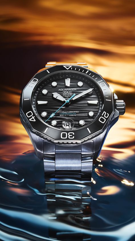 TAG Heuer has just unveiled updated versions of the Aquaracer Professional 300 Date & GMT. These revisions include subtle changes to the dial, a new smaller 42 mm case and the inclusion of a far superior COSC-certified movement. Angus Davies takes a deep dive into the latest subaquatic models.  #TAGHeuer #Aquaracer #Chronometer #DiversWatch Tag Heuer Aquaracer Professional 300, Tag Heuer Aquaracer, Dressing Sense, Seek Adventure, Tag Heuer Watch, Divers Watch, Small Case, Watch Review, Fine Watches