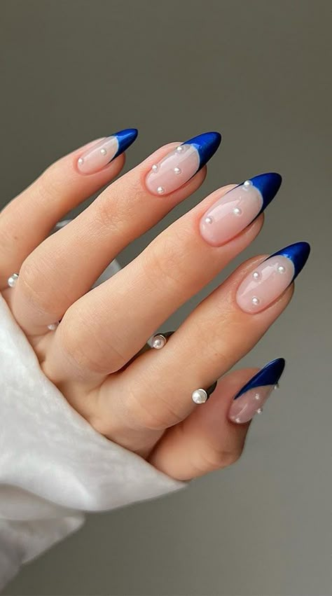 blue french tips with pearls, blue nails, butterfly blue nails, blue nail designs, blue nail art, blue nail ideas, mismatched blue nails, short blue nails, simple blue nails, almond blue nails