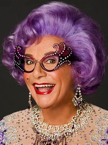 Dame Edna is a character created and played by Australian dadaist performer and comedian, Barry Humphries, famous for her lilac-coloured or "wisteria hue" hair and cat eye glasses or "face furniture," ... Hockney Portraits, Hockney Paintings, David Hockney Portraits, David Hockney Paintings, Barry Humphries, Dame Edna, Australian Icons, Maggie Smith, Australia Day