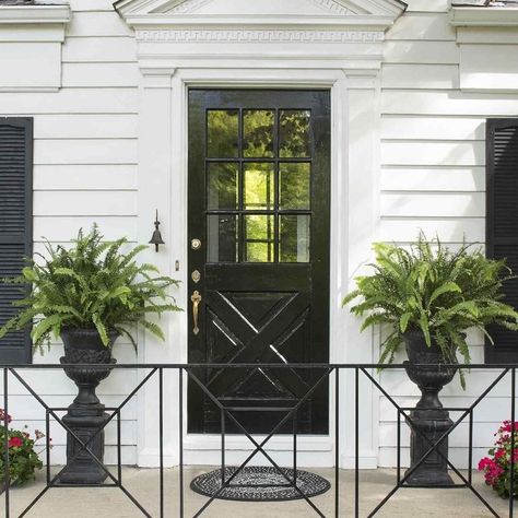 Better Homes & Gardens on Instagram: “We’re seeing more and more homeowners going for a black front door! It’s true what they say: black goes with everything. Any time you want…” Iron Railings Outdoor, Porch Railing Designs, Front Porch Railings, Flagstone Path, Black Front Doors, Railings Outdoor, Flagstone Patio, Porch Railing, Garden Makeover